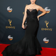 Neve Campbell arrives at the 68th Primetime Emmy Awards on Sunday, Sept. 18, 2016, at the Microsoft Theater in Los Angeles. (Photo by Danny Moloshok/Invision for the Television Academy/AP Images)